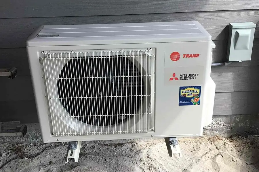 Trane Mitsubishi Electric mini-split unit mounted outside a home