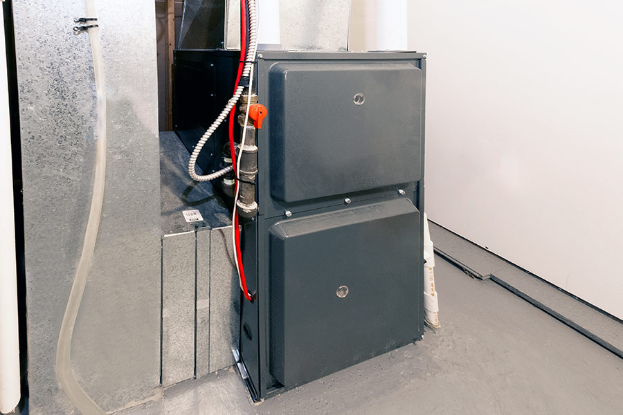 High-efficiency gas furnace with ductwork and ventilation
