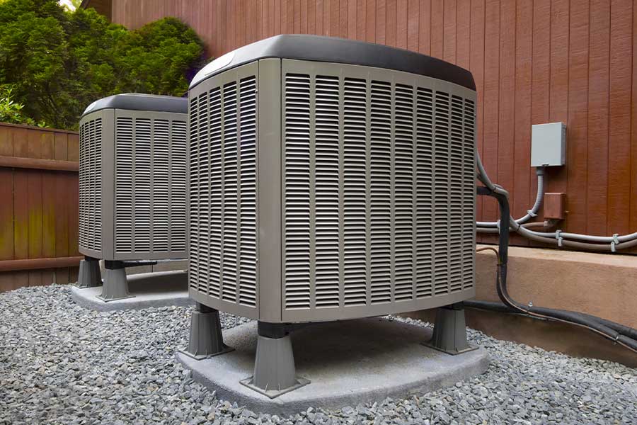 Two outdoor AC condenser units